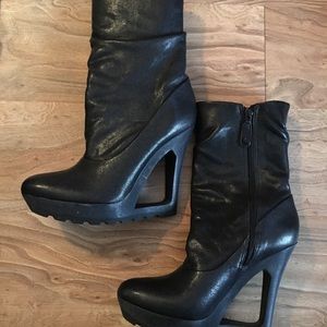 Bcbg black boot with cut out wedge